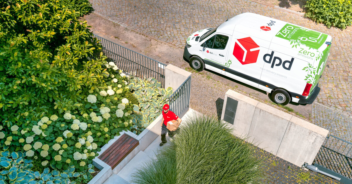 DPD Zero Emissions all electric van, with driver delivering parcel