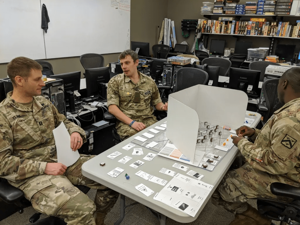 Military personnel engaging in tabletop war games
